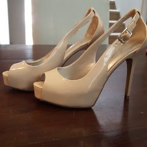 Nude patent heels